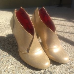 Women's gold booties, size 8 M.